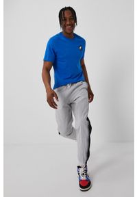 Nike Sportswear Spodnie męskie kolor szary gładkie. Kolor: szary. Materiał: tkanina. Wzór: gładki #1