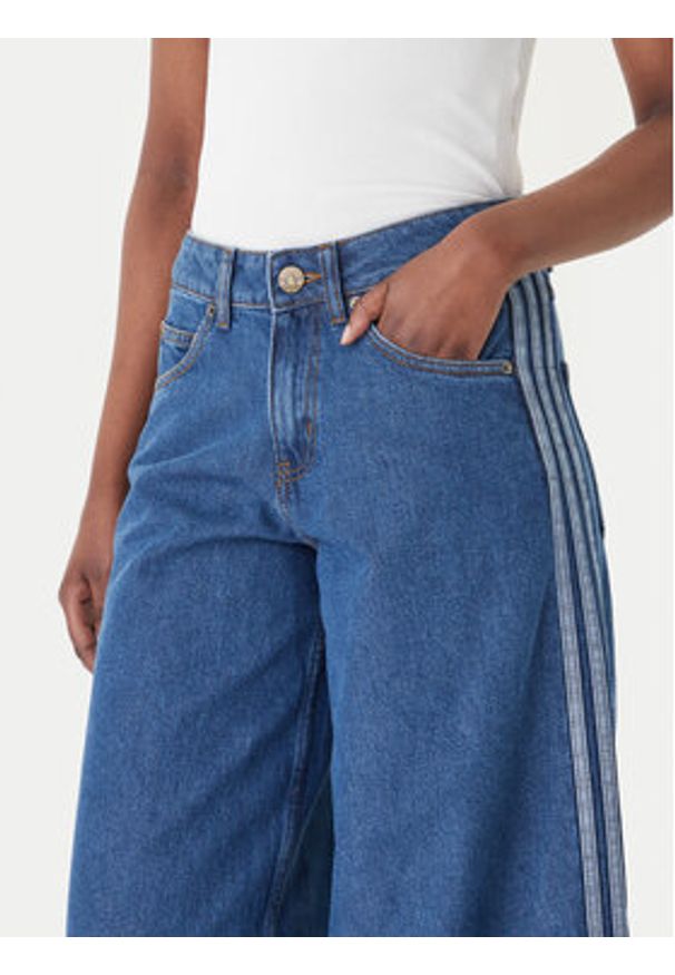 Adidas - adidas Jeansy Firebird Adilenium KD2906 Niebieski Wide Leg. Kolor: niebieski