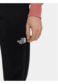 The North Face Spodnie dresowe Standard NF0A5ID4 Czarny Regular Fit. Kolor: czarny. Materiał: bawełna