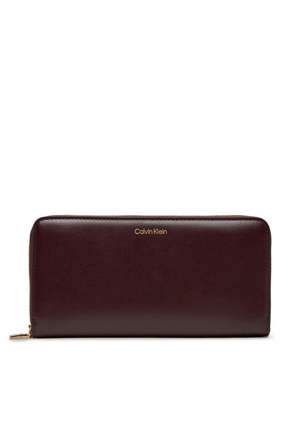 Calvin Klein Duży Portfel Damski Ck Large Zip Around LV04F1093G Bordowy. Kolor: czerwony. Materiał: skóra