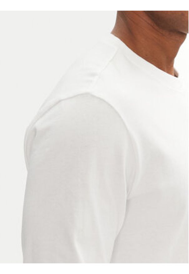 Champion Longsleeve 221164 Biały Loose Fit. Kolor: biały. Materiał: bawełna. Długość rękawa: długi rękaw