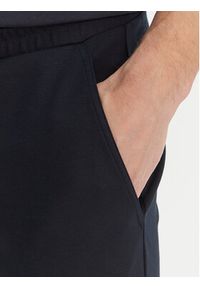 Bugatti Spodnie dresowe 8250-15123E Granatowy Relaxed Fit. Kolor: niebieski. Materiał: wiskoza #5