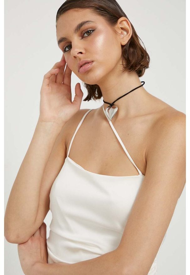 Hollister Co. top damski kolor beżowy. Okazja: na co dzień. Typ kołnierza: dekolt w karo. Kolor: beżowy. Materiał: tkanina. Długość rękawa: na ramiączkach. Styl: casual