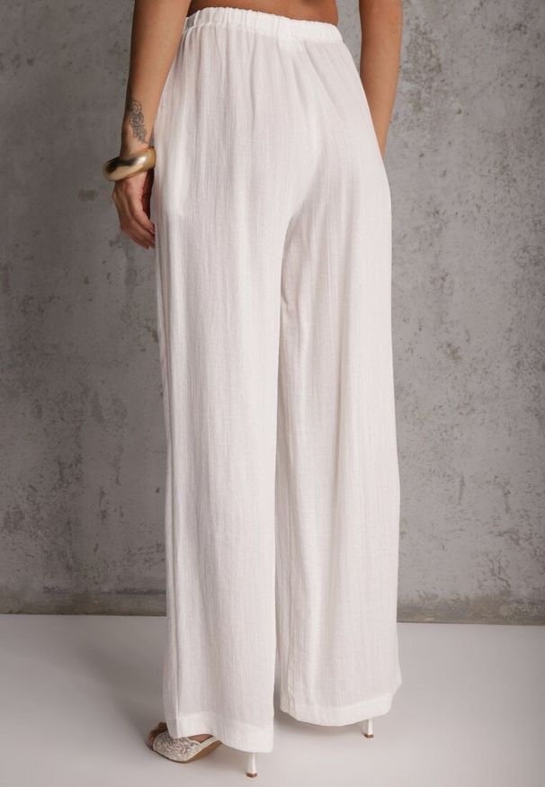 Renee - Białe Spodnie Wide Leg High Waist z Wiskozy Terilinae. Okazja: na co dzień. Stan: podwyższony. Kolor: biały. Materiał: wiskoza. Wzór: haft. Styl: casual