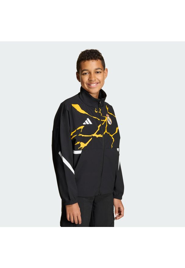 Adidas - Bluza adidas Real Madrid Avengers Z.N.E. Anthem Kids. Kolor: czarny. Materiał: dresówka. Wzór: motyw z bajki. Sport: piłka nożna