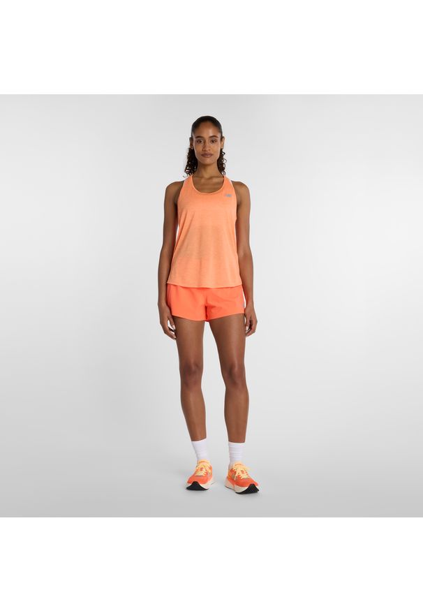Spodenki damskie New Balance WS41286AAE – pomarańczowe. Kolor: pomarańczowy. Materiał: materiał, poliester. Sport: fitness