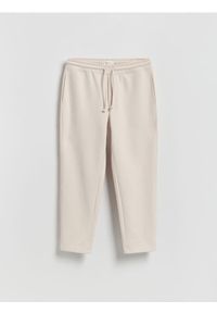 Reserved - Spodnie dresowe regular fit - beżowy. Kolor: beżowy. Materiał: dresówka