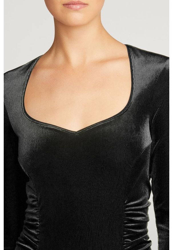 Wolford Body kolor czarny gładki. Kolor: czarny. Wzór: gładki
