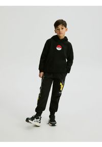 Reserved - Dresowe spodnie Pokémon - czarny. Kolor: czarny. Materiał: dresówka #1