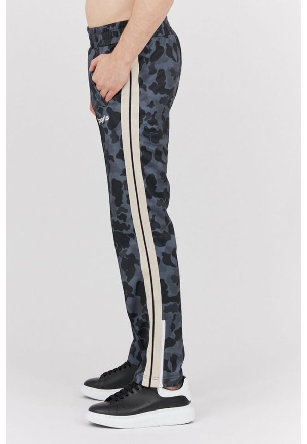 PALM ANGELS Szare spodnie męskie w moro, Rozmiar M. Kolor: szary. Materiał: dresówka. Długość: krótkie. Wzór: moro