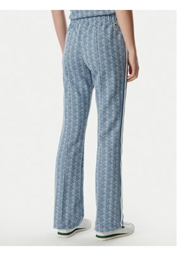 Lacoste Spodnie dresowe XF9313 Niebieski jasny Regular Fit. Kolor: niebieski. Materiał: syntetyk