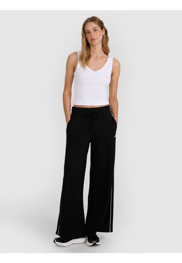 4f - 4F Spodnie dresowe z wiskozą damskie - czarne XL. Kolor: czarny. Materiał: wiskoza, dresówka. Wzór: ze splotem, gładki. Sport: fitness