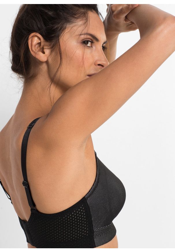 bonprix - Biustonosz sportowy, silny stopień podtrzymywania biustu. Kolor: czarny. Rodzaj stanika: wyściełane miseczki, różne sposoby noszenia