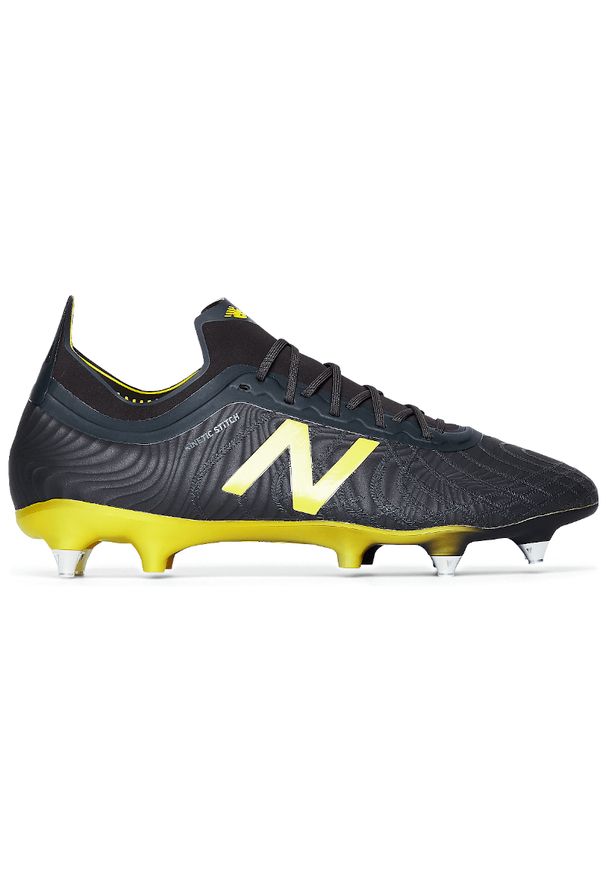Buty do piłki nożnej New Balance z paskami, w paski