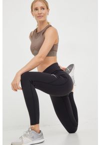Reebok legginsy treningowe Lux Vector damskie kolor czarny z nadrukiem. Kolor: czarny. Materiał: skóra, materiał. Wzór: nadruk. Sport: fitness #1