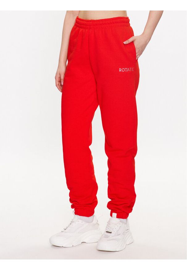 ROTATE Spodnie dresowe Mimi 7001571030 Czerwony Relaxed Fit. Kolor: czerwony. Materiał: bawełna