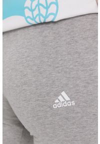 Adidas - adidas Legginsy damskie kolor szary melanżowe. Stan: podwyższony. Kolor: szary. Materiał: dzianina, bawełna. Wzór: melanż