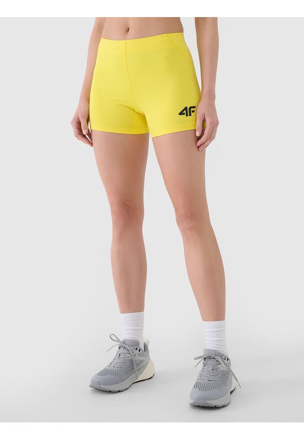 4f - 4F Legginsy krótkie treningowe damskie - żółte XL. Kolor: żółty. Materiał: dzianina, elastan, włókno, syntetyk, materiał. Długość: krótkie. Wzór: gładki, jednolity, ze splotem. Sport: fitness