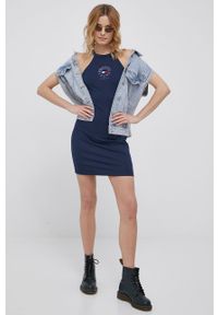Tommy Jeans sukienka kolor granatowy mini dopasowana. Kolor: niebieski. Materiał: dzianina. Wzór: aplikacja. Typ sukienki: dopasowane. Długość: mini