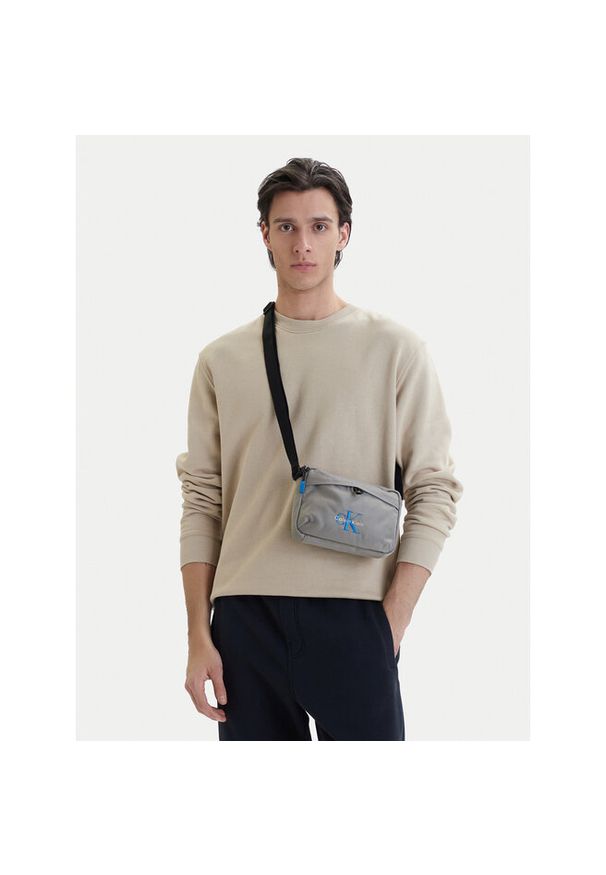 Saszetka Calvin Klein. Kolor: szary