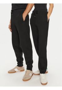 AMI PARIS Spodnie dresowe UTR237.749 Czarny Relaxed Fit. Kolor: czarny. Materiał: bawełna