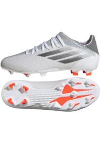 Adidas - Buty piłkarskie adidas X Speedflow.3 Fg Jr FY3305 szary, biały białe. Kolor: biały, wielokolorowy, szary. Materiał: dzianina, syntetyk. Szerokość cholewki: normalna. Sport: piłka nożna