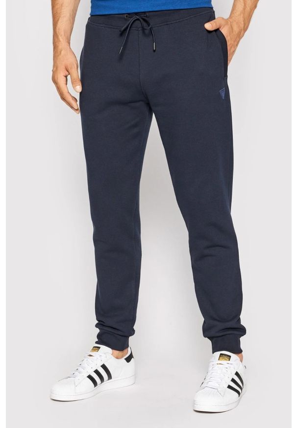 Guess - GUESS Granatowe męskie spodnie Aldwin, Rozmiar XL. Kolor: niebieski. Materiał: poliester, bawełna, materiał