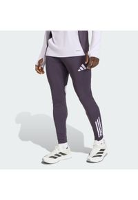 Adidas - Spodnie Manchester United Tiro 25 Competition Training. Kolor: fioletowy, wielokolorowy, czarny. Sport: piłka nożna #1
