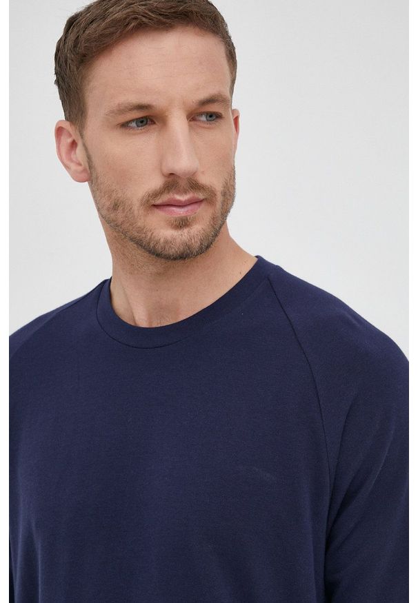 Polo Ralph Lauren bluza kolor granatowy gładka. Okazja: na co dzień. Typ kołnierza: polo. Kolor: niebieski. Materiał: dzianina. Długość rękawa: raglanowy rękaw. Wzór: gładki. Styl: casual