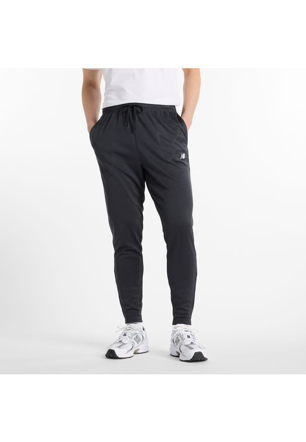 Spodnie męskie New Balance MP51905BK – czarne. Kolor: czarny. Materiał: poliester, materiał. Sport: fitness