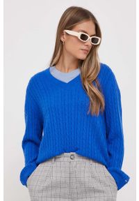 TOMMY HILFIGER - Tommy Hilfiger sweter wełniany damski kolor turkusowy lekki. Kolor: niebieski. Materiał: wełna. Długość rękawa: długi rękaw. Długość: długie. Wzór: ze splotem