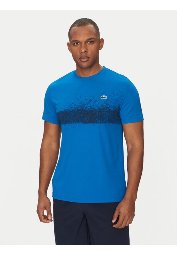 Lacoste T-Shirt TH8986 Niebieski Regular Fit. Kolor: niebieski. Materiał: syntetyk