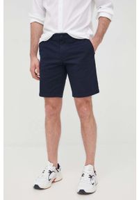 TOMMY HILFIGER - Tommy Hilfiger szorty BROOKLYN 1985 męskie kolor granatowy. Okazja: na co dzień. Kolor: niebieski. Materiał: tkanina, bawełna, włókno. Wzór: gładki. Styl: casual #1