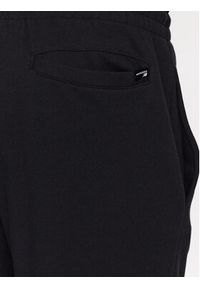 New Balance Spodnie dresowe MP31902 Czarny Regular Fit. Kolor: czarny. Materiał: dresówka, syntetyk, bawełna
