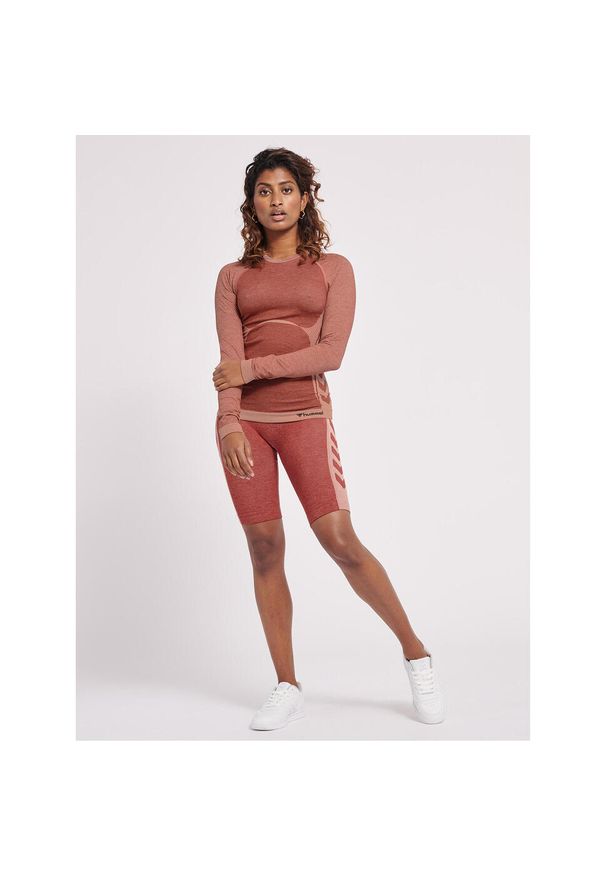 Damska koszulka z długim rękawem Hummel Clea. Kolor: czerwony, fioletowy, wielokolorowy, różowy. Długość rękawa: długi rękaw. Długość: długie. Sport: piłka ręczna