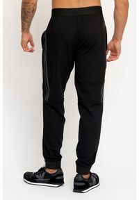 EA7 Emporio Armani - EA7 Męskie spodnie dresowe z lampasami, Rozmiar XL. Kolor: czarny. Materiał: dresówka, poliester. Wzór: aplikacja #3