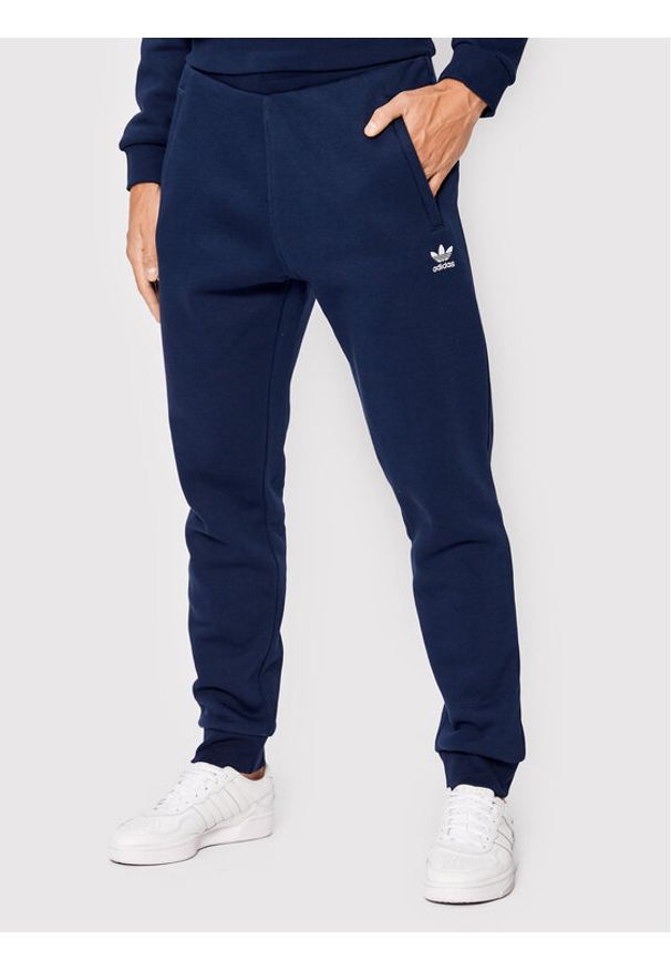 Adidas - Spodnie dresowe adidas. Kolor: niebieski. Materiał: dresówka