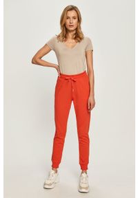 Armani Exchange - Spodnie. Kolor: czerwony. Materiał: bawełna, materiał, dzianina, elastan. Wzór: gładki #5