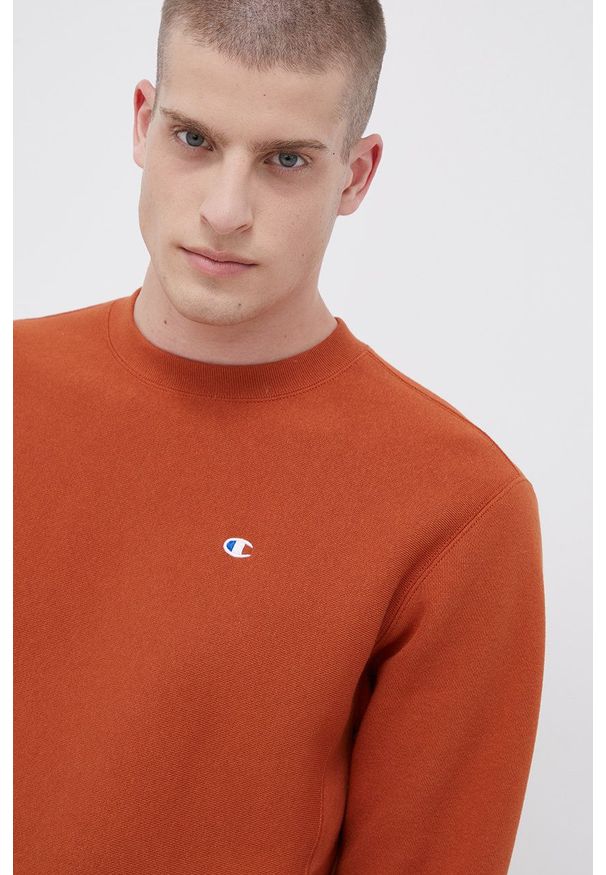 Champion Bluza 216495 męska kolor pomarańczowy z aplikacją. Kolor: pomarańczowy. Wzór: aplikacja