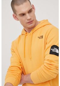 The North Face bluza bawełniana Black Box męska kolor pomarańczowy z kapturem z nadrukiem. Typ kołnierza: kaptur. Kolor: pomarańczowy. Materiał: bawełna. Wzór: nadruk #2