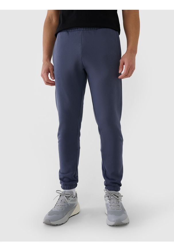 4f - 4F Spodnie dresowe joggery męskie - szare M. Kolor: szary. Materiał: dresówka. Wzór: gładki, ze splotem