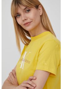 Calvin Klein Jeans t-shirt bawełniany kolor żółty. Okazja: na co dzień. Kolor: żółty. Materiał: bawełna. Wzór: nadruk. Styl: casual