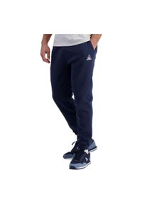 Wąskie spodnie do biegania Le Coq Sportif N°2. Kolor: niebieski. Materiał: dresówka. Sport: fitness