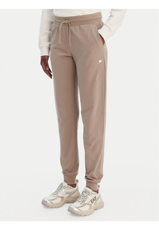 EA7 Emporio Armani Spodnie dresowe 7W000461 AF13135 U6167 Beżowy Regular Fit. Kolor: beżowy. Materiał: bawełna