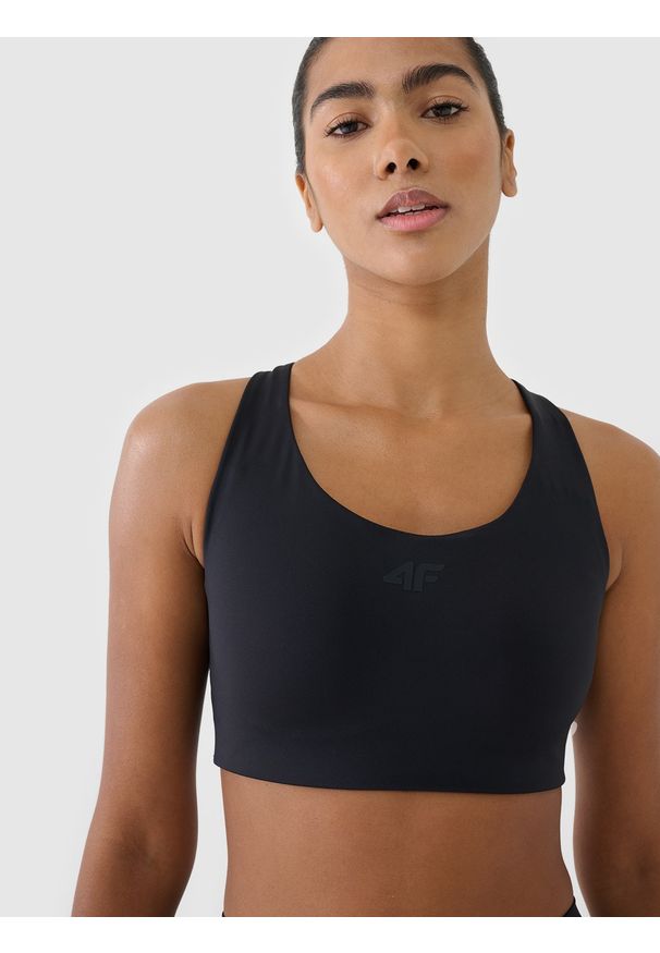 4f - 4F Biustonosz treningowy ze średnim wsparciem - czarny M. Kolor: czarny. Materiał: dzianina, materiał, syntetyk, włókno, jersey, guma, elastan, tkanina. Wzór: gładki, ze splotem. Sport: bieganie, kolarstwo, fitness