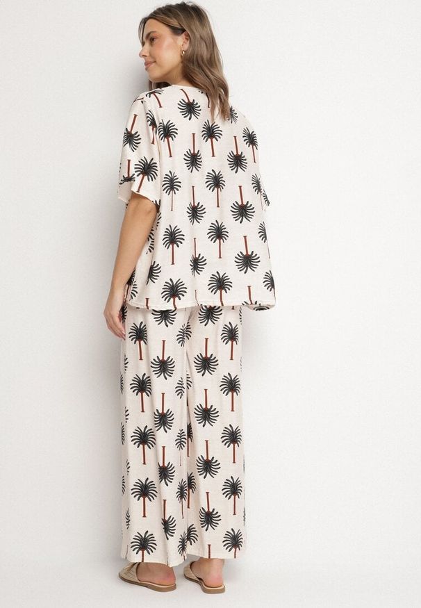Born2be - Beżowo-Czarny Wiskozowy Komplet we Wzór z Palmami Szerokie Spodnie i T-shirt Zivendra. Kolor: beżowy. Materiał: wiskoza