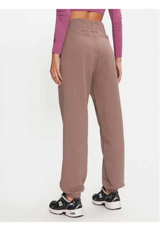 Karl Kani Spodnie dresowe Small Signature 61030014 Beżowy Relaxed Fit. Kolor: beżowy. Materiał: bawełna