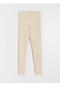 Sinsay - Prążkowane legginsy z gumką w pasie - kremowy. Kolor: kremowy. Materiał: prążkowany #1
