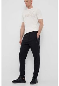 Hummel spodnie dresowe Interval kolor czarny gładkie. Kolor: czarny. Materiał: dresówka. Wzór: gładki