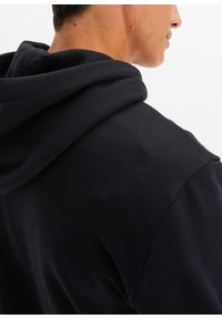 bonprix - Bawełniana bluza z kapturem. Typ kołnierza: kaptur. Kolor: czarny. Materiał: bawełna. Wzór: prążki #2